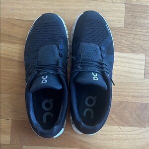 On Running Black and White Athletic Shoes